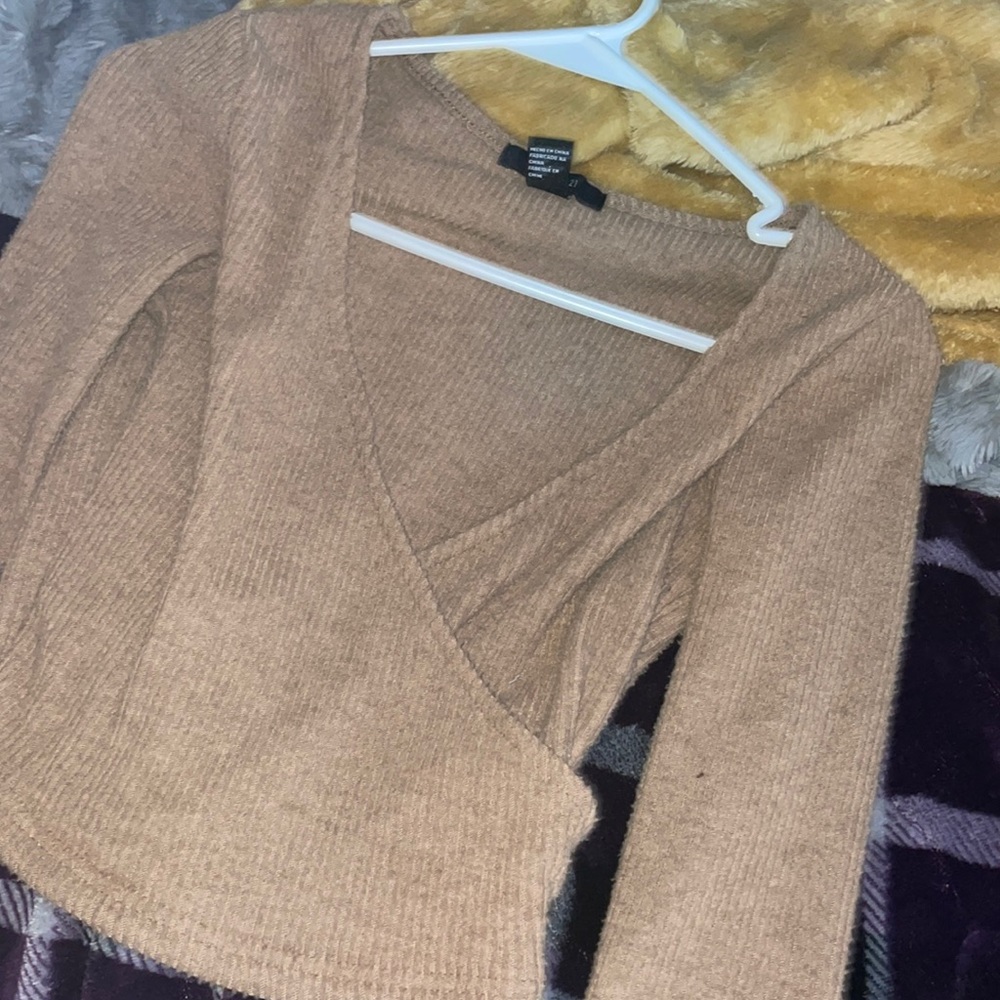 Cross over brown top, not a crop top but it can be